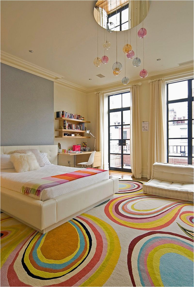 Contemporary kids bedroom inside New York home with fashionable rug