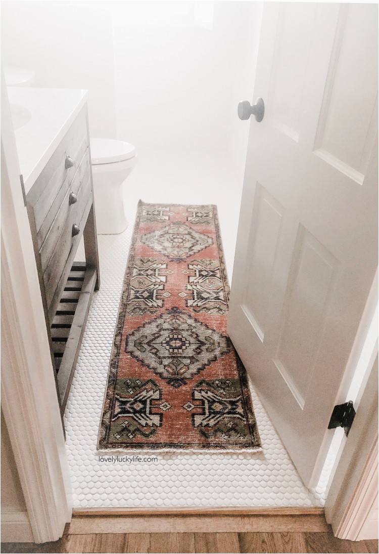 vintage turkish rug in bathroom copy
