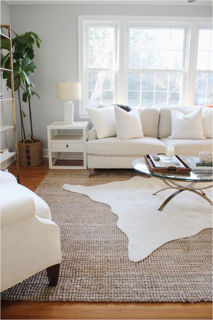 Textured area Rug Living Room How to Perfect the Layered Rug Look Rugs In Living Room