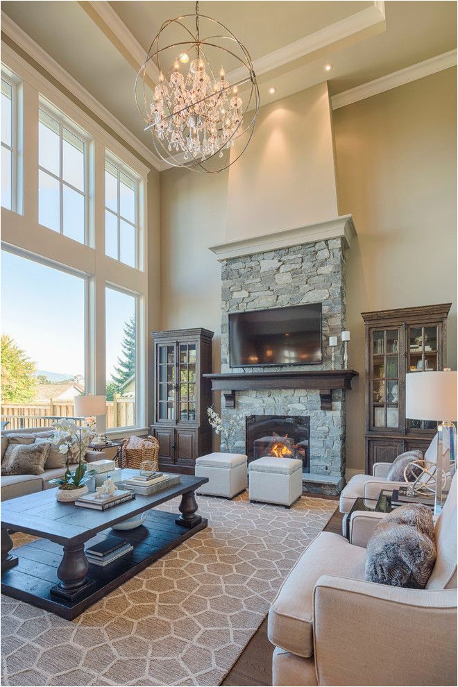 Living Rooms with Large area Rugs Living Room with Two Story Windows Gorgeous Lighting