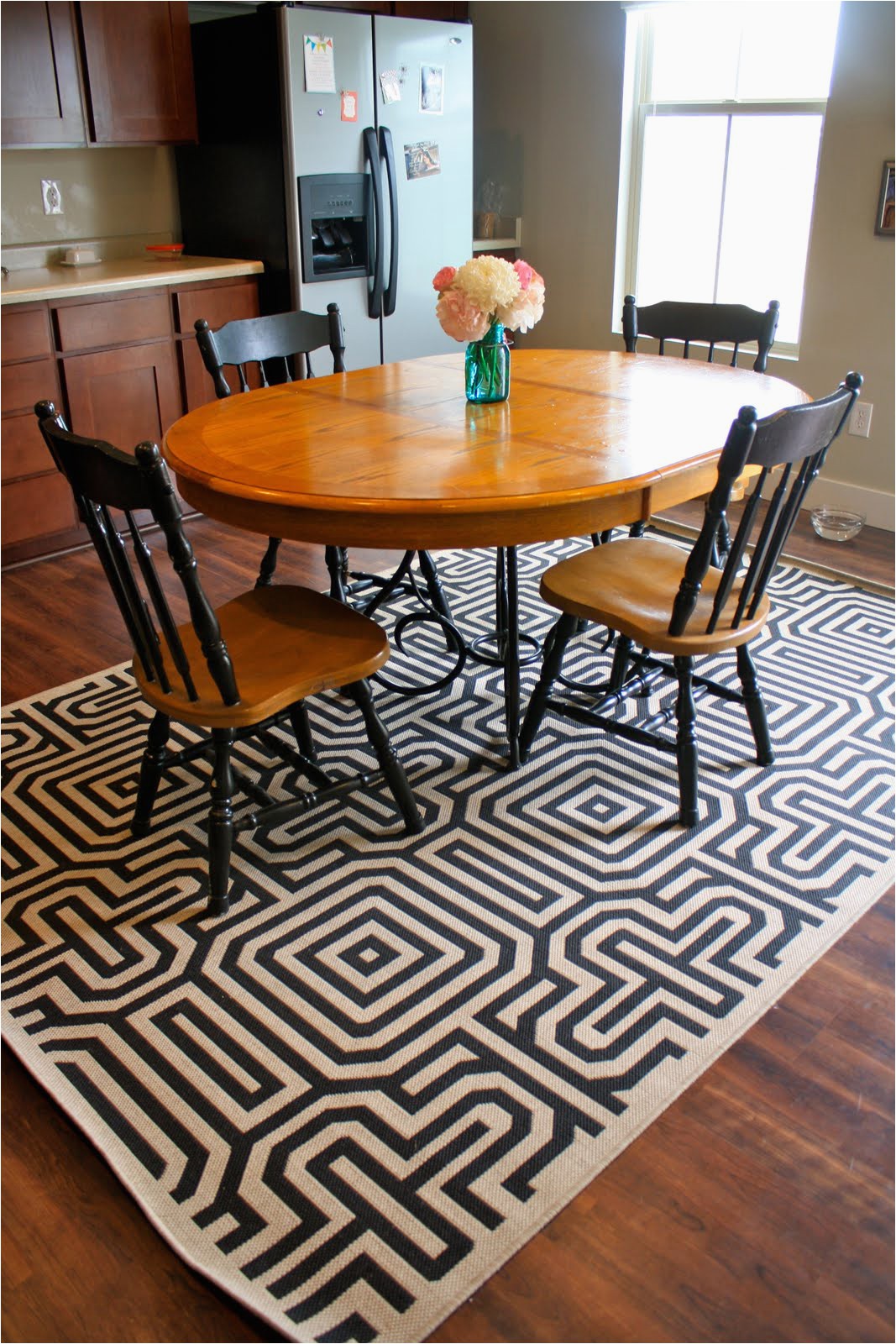 Round area Rug for Under Kitchen Table 30 Rugs that Showcase their Power Under the Dining Table
