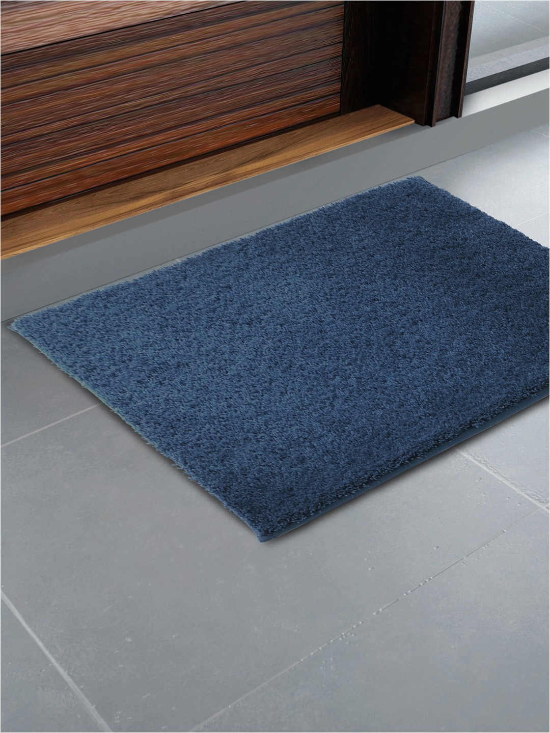 Denim Blue Bath Rug Core Designed by Spaces Blue solid 1600 Gsm Rectangular Bath Rug