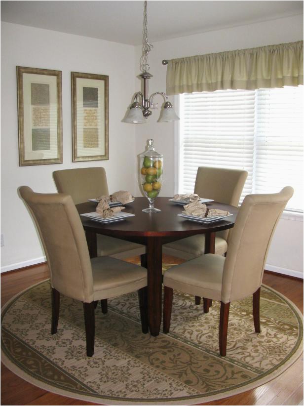Dining Room Table with area Rug Neutral Transitional Dining Room with Round Table and area