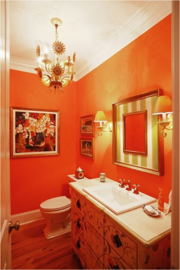 Bright orange Bath Rugs orange Powder Room with Chandelier and Bright Artworks