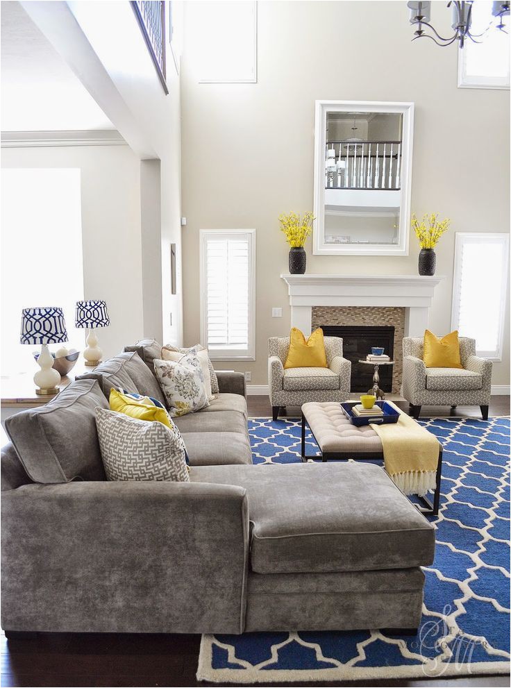 Grey Couch Blue Rug Take Hues From these Beautifully Decorated Rooms and Switch