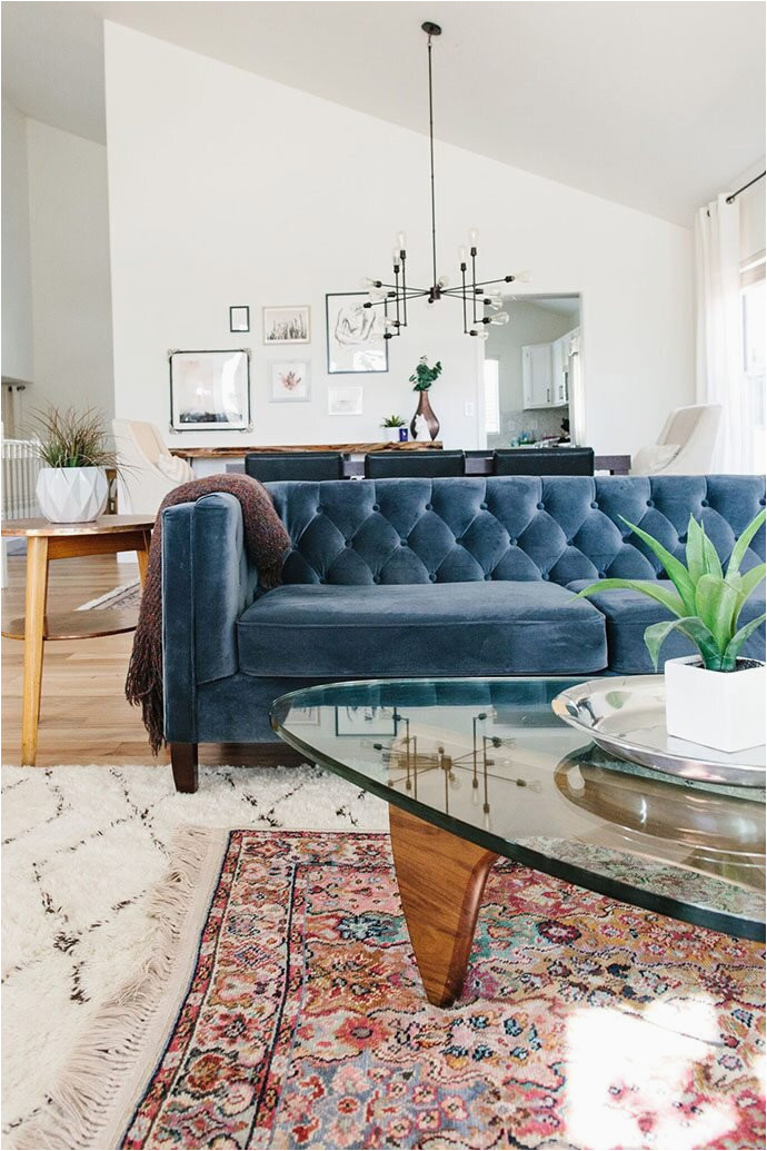 Rug with Blue Couch How to Layer Your Rugs Like A Pro Martha Stewart