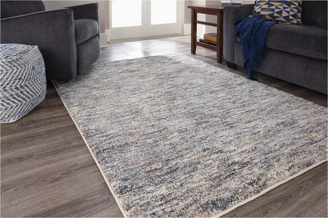 Ashley Furniture Blue Rugs ashley Marnin 5′ X 7′ area Rug – Tan/blue/cream â Serra Furniture