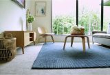 Area Rug On Carpet Living Room Tips for Using area Rugs Over Carpet