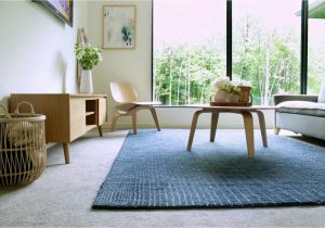 Area Rug On Carpet Living Room Tips for Using area Rugs Over Carpet