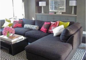 Area Rug with Gray Sectional Lounge Room with Built In Shelf. Grey Lounge, Patterned Rug and …