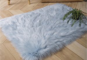 Baby Blue Fur Rug Phantoscope Deluxe soft Faux Sheepskin Fur Series Decorative Indoor area Rug 2 X 3 Feet Rectangle, Light Blue, 1 Pack