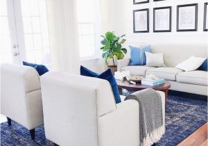 Blue and White Rug Living Room Coastal Living Room Design with White sofa and Blue Rug