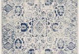 Blue Print area Rugs Covered In A Mix Of Floral and Geometric Patterns This