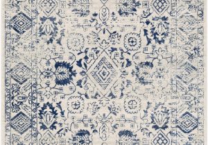 Blue Print area Rugs Covered In A Mix Of Floral and Geometric Patterns This