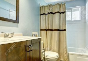 Brown and Blue Bathroom Rugs Bathroom with Brown Tile Floor and Light Blue Walls Wooden Brown