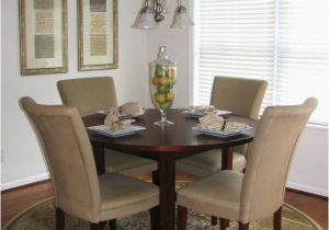 Dining Room Table with area Rug Neutral Transitional Dining Room with Round Table and area