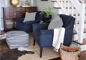 Navy Blue Cowhide Rug Living Room with Abstract Art Navy Chairs Jute Rug & Faux