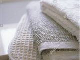 Organic Cotton Bath Rug Folded organic Cotton towels and Bath Mats Close Up Stock