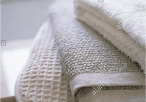 Organic Cotton Bath Rug Folded organic Cotton towels and Bath Mats Close Up Stock