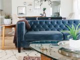 Rug with Blue Couch How to Layer Your Rugs Like A Pro Martha Stewart
