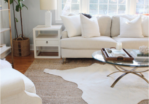 Textured area Rug Living Room How to Perfect the Layered Rug Look Rugs In Living Room
