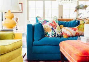 What Color Rug with Blue Couch Colorful Living Room Blue sofa orange Ottoman Yellow