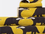 Yellow Bath towels and Rugs Anorak Kissing Badgers towels